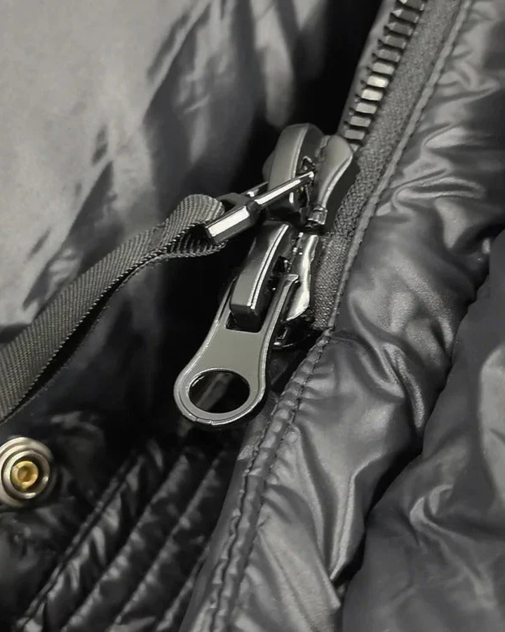 Women's Long Puffer Jacket with Hood and Quilted Panels