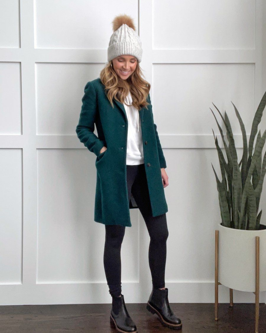 Women's Mid Length Coat with Notched Lapels and Button Front Closure