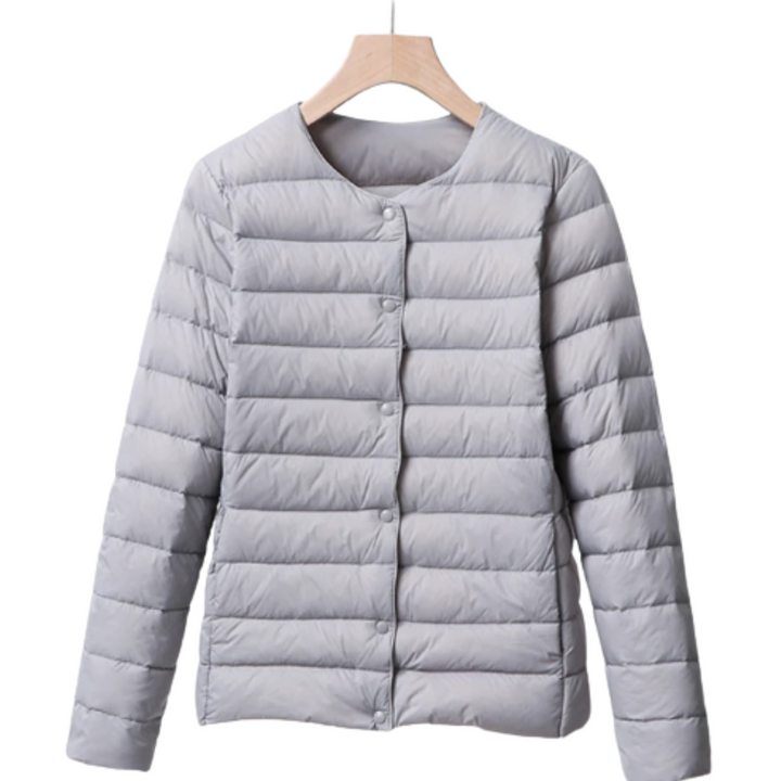 Women's Quilted Puffer Jacket with Round Neckline and Snap Button Closure