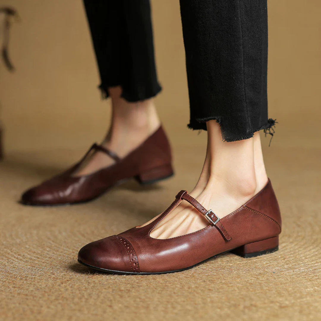 Women's T Strap Flats with Brogue Perforations and Buckle Closure